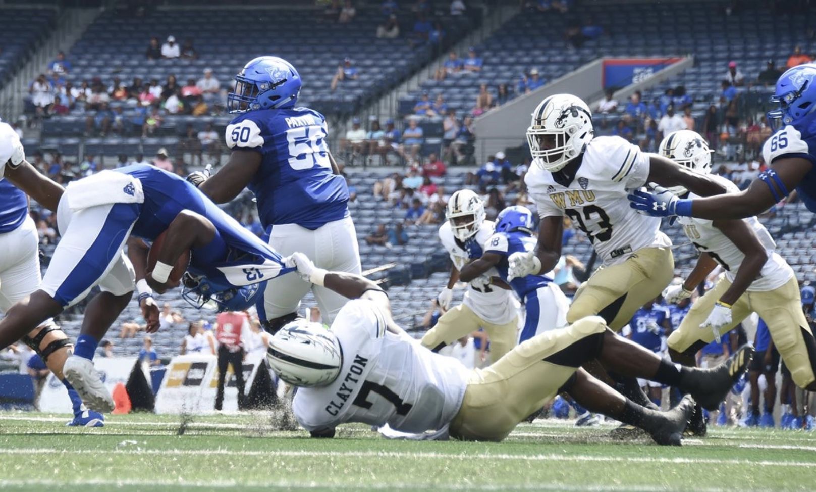 Najee Clayton brings down Georgia State's QB (Dan Ellington) in their matchup in 2018.
